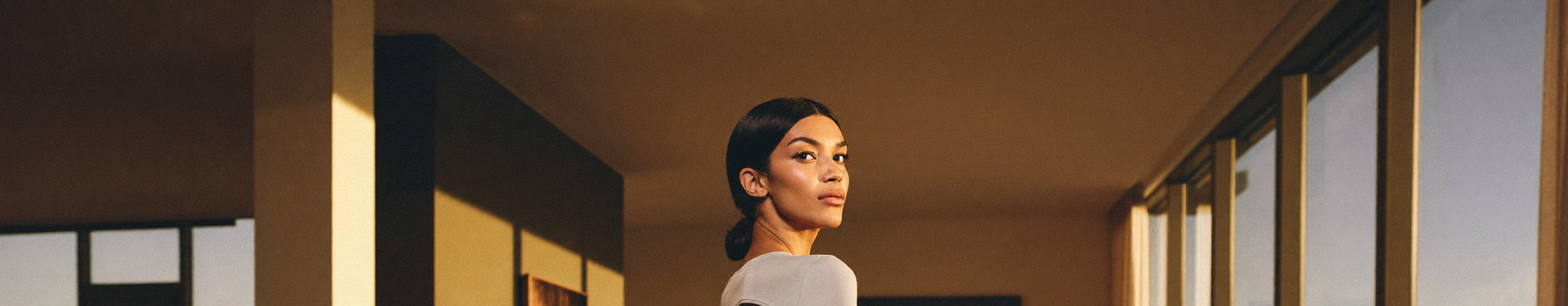 A self-assured woman in a bright modern space, restored and unmistakably herself